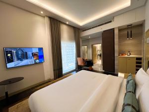 TV a/nebo společenská místnost v ubytování Grayton Hotel by Blazon Hotels