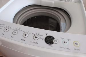 石垣島にあるcottage SOUL MATEの洗濯機のクローズアップ