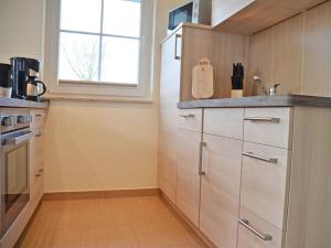 Küche/Küchenzeile in der Unterkunft Strandhus Sellin - Apt. 02