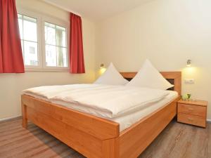Ein Bett oder Betten in einem Zimmer der Unterkunft Strandhus Sellin - Apt. 02