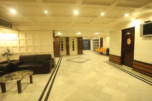 Foto da galeria de Tex Palazzo Hotel em Surat
