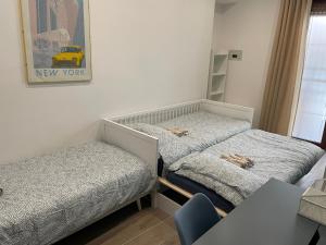 Ένα ή περισσότερα κρεβάτια σε δωμάτιο στο CRISPI 74.1 - Apartment