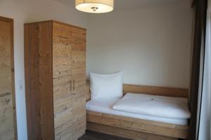 Postel nebo postele na pokoji v ubytování Apart Alpin