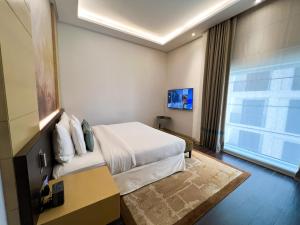 TV a/nebo společenská místnost v ubytování Grayton Hotel by Blazon Hotels