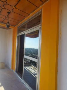 Ein Balkon oder eine Terrasse in der Unterkunft Résidence Diakhaby