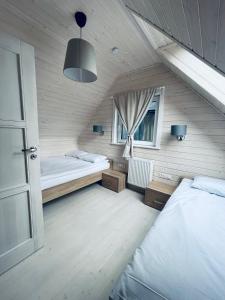Giường trong phòng chung tại Holiday Park & Resort Cieplice Zdrój