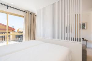 Postel nebo postele na pokoji v ubytování SÖK LA ROMANA seafront Marbella