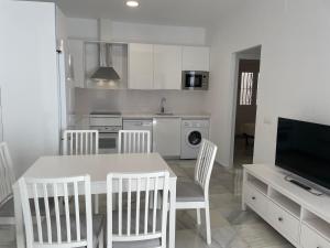 Kuchyňa alebo kuchynka v ubytovaní Apartamentos Registro Ronda Centro
