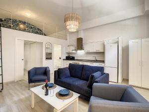 Kuchyň nebo kuchyňský kout v ubytování ApartCity Triana + 14 fotografií