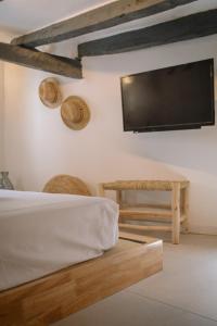 Telewizja i/lub zestaw kina domowego w obiekcie Mayor 36 by Seaward Suites