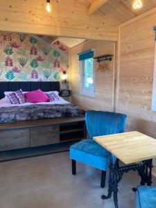 Postel nebo postele na pokoji v ubytování Dunroamin Lodges