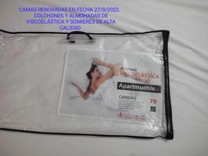 Certificado, premio, señal o documento que está expuesto en Apartamento primera línea de mar