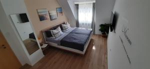 Una cama o camas en una habitación de Blickpunkt