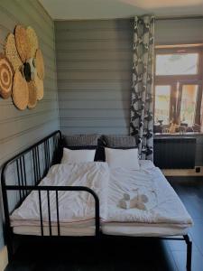 Postel nebo postele na pokoji v ubytování Willa Piwniczka Apartament Jahlowej