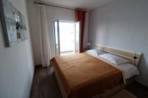 Postel nebo postele na pokoji v ubytování App Marin