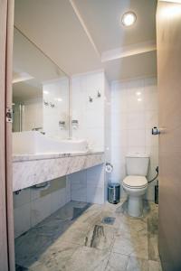 Een badkamer bij Kresten Palace Hotel