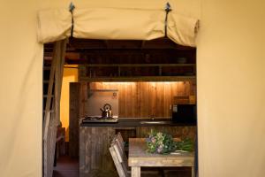 Kuchyň nebo kuchyňský kout v ubytování Camping Campo dei Fiori