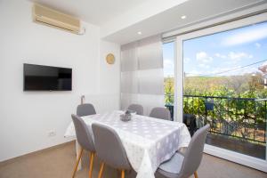 TV a/nebo společenská místnost v ubytování Apartment Falichi