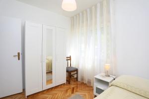 Postel nebo postele na pokoji v ubytování Apartment Falichi