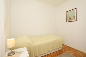 Postel nebo postele na pokoji v ubytování Apartment Falichi