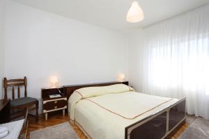 Postel nebo postele na pokoji v ubytování Apartment Falichi