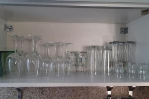 a row of glass jars sitting on a shelf at Paulus Gästehaus Top 2 in Salzburg