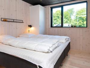 Postel nebo postele na pokoji v ubytování 12 person holiday home in Haderslev