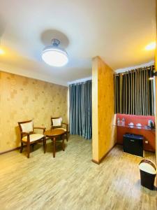 Posezení v ubytování Sundale Hotel