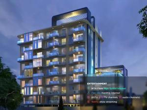 a rendering of a building with lights on at Luxury 2 Bedroom Apartment with Huge Balcony , Pool, Gym at Tribute House in Accra