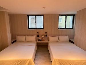Letto o letti in una camera di 微光宿 LIGHt
