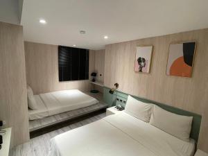 Letto o letti in una camera di 微光宿 LIGHt