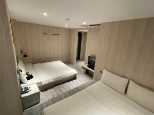 Letto o letti in una camera di 微光宿 LIGHt