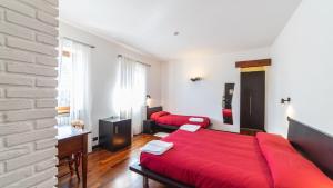Ένα ή περισσότερα κρεβάτια σε δωμάτιο στο Sogni di Langa