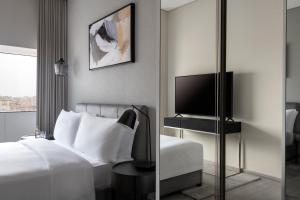 โทรทัศน์และ/หรือระบบความบันเทิงของ Steigenberger Residence Doha
