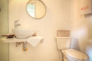 a bathroom with a sink and a toilet at Casa Logos Hotel Boutique in Cartagena de Indias