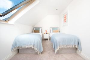 Postel nebo postele na pokoji v ubytování The Haybarn