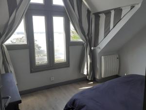 Postel nebo postele na pokoji v ubytování Maison vue exeptionnelle sur la mer