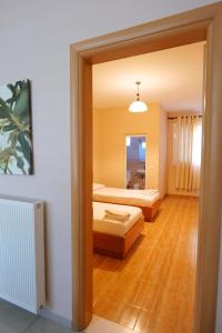 Postel nebo postele na pokoji v ubytování Hotel Jali
