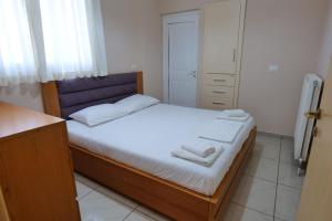 Postel nebo postele na pokoji v ubytování Hotel Jali
