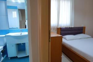Postel nebo postele na pokoji v ubytování Hotel Jali