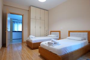 Postel nebo postele na pokoji v ubytování Hotel Jali