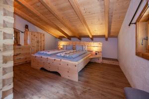 Letto o letti in una camera di Ferienhütte Sternenblick