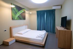 Postel nebo postele na pokoji v ubytování Hotel Jali + 37 fotografií