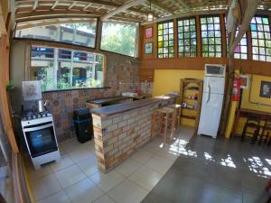 Gallery image of Pousada El Pátio da Ferrugem uma quadra da praia in Garopaba