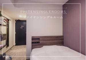 Postel nebo postele na pokoji v ubytování Henn na Hotel Tokyo Hamamatsucho