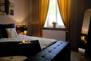 Posteľ alebo postele v izbe v ubytovaní Apartament Parkowa