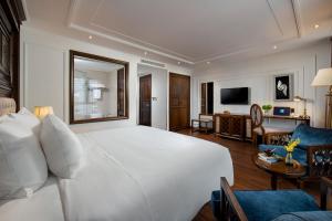 Voodi või voodid majutusasutuse The Q Hotel toas