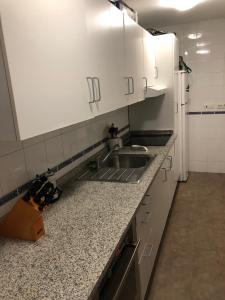 Kuchyň nebo kuchyňský kout v ubytování Maravilloso alojamiento en pleno centro de Dos Hermanas