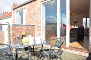 En balkon eller terrasse på Parrotfish Bay + 9 billeder