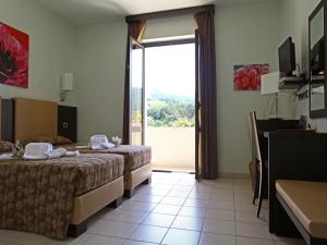 Postel nebo postele na pokoji v ubytování Euro Hotel + 37 fotografií